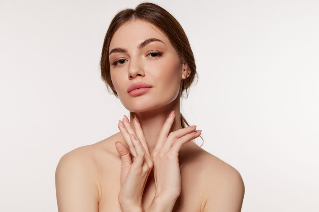 Woman with smooth skin from HA filler treatment